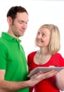 Young couple using tablet pc Royalty Free Stock Photo