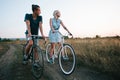 Young couple on vintage bikes