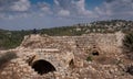 Young couple visiting ruins of the destroyed medieval arab village near Jerusalem