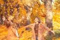 Young couple walk in the autumn park