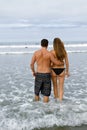 Young Couple Walk In the Ocean Royalty Free Stock Photo