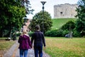 Young couple is walking around Clifford tower in York in September 2018