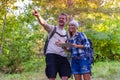 Young couple walking in the forest. Hiking concept in the mountain Royalty Free Stock Photo