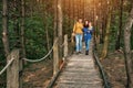 A young couple walks in the woods with a little boy Royalty Free Stock Photo