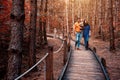 A young couple walks in the woods with a little boy Royalty Free Stock Photo