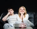 Young couple watching a movie Royalty Free Stock Photo