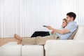 Young couple watching television Royalty Free Stock Photo