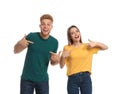 Young couple wearing blank t-shirts on white. Mockup for design Royalty Free Stock Photo