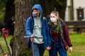 Young couple wearing face mask .