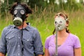 Young Couple Wearing Gas Masks Royalty Free Stock Photo