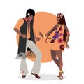 Young couple wearing hippie clothes of the 60s and 70s dancing