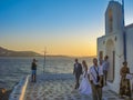 Young couple on wedding cerimony by the sea in Mykonos