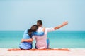 Young couple on white beach during summer vacation. Happy family enjoy their honeymoon Royalty Free Stock Photo