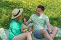 young couple woman and man on a picnic in the garden Royalty Free Stock Photo