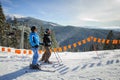 Young couple of women enjoying skiing at ski resort Royalty Free Stock Photo