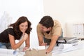 Young couple working at architect office Royalty Free Stock Photo