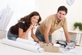 Young couple working at architect office Royalty Free Stock Photo