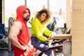 Couple Training on Bicycle in a Gym Royalty Free Stock Photo