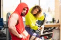 Couple Training on Bicycle in a Gym Royalty Free Stock Photo