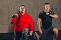 Young couple is working out at sport center . Royalty Free Stock Photo