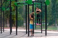 Young couple working out together at outdoor gym Royalty Free Stock Photo