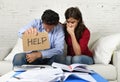 Young couple worried at home in bad financial situation stress asking for help Royalty Free Stock Photo