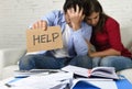 Young couple worried at home in bad financial situation stress asking for help Royalty Free Stock Photo