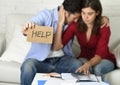 Young couple worried at home in bad financial situation stress asking for help Royalty Free Stock Photo