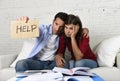 Young couple worried at home in bad financial situation stress asking for help Royalty Free Stock Photo