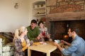 Young couples in cosy cottage Royalty Free Stock Photo