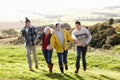 Young couples on country walk Royalty Free Stock Photo