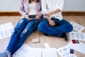 Young couples with debt problems have stress to find ways to pay bills and credit cards. Royalty Free Stock Photo