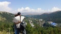 Young couples went to the tourist city of Jermuk, stand on the mountain and manually show each other what picturesque places