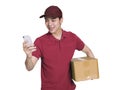 The young courier using smart phone to search and standing in front of a white background