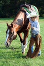 Young cowboy and horse Royalty Free Stock Photo