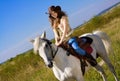 Young cowgirl on horse