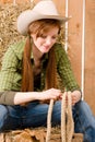 Young cowgirl western country style with rope Royalty Free Stock Photo