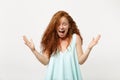 Young crazy redhead woman girl in casual light clothes posing isolated on white wall background in studio. People