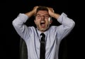 Young crazy stressed businessman in worried tired face expression screaming desperate Royalty Free Stock Photo