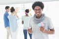 Young creative man smiling at camera Royalty Free Stock Photo