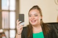 Confident Professional Woman with Braces Using her Phone Royalty Free Stock Photo