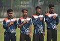 Young cricketers are showing respect to the National Anthems Royalty Free Stock Photo