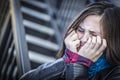 Young Crying Teen Aged Girl on Staircase Royalty Free Stock Photo