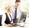 Young customer support operators in the office Royalty Free Stock Photo