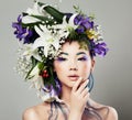 Young Cute Asian Model Woman with Blossom Flower Hairstyle Royalty Free Stock Photo