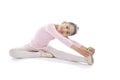 Young cute Ballerina girl stretching wearing pink Ballet tutu Royalty Free Stock Photo