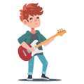 young cute boy with guitar learns to play. young rocker. Royalty Free Stock Photo
