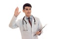 Young cute doctor in blue uniform with stethoscope on his neck isolated on white background