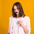 Young cute girl with moustache, studio Royalty Free Stock Photo