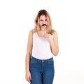 Young cute girl with moustache, studio Royalty Free Stock Photo